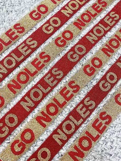 shopping boutique local pensacola tallahassee florida state fsu beaded purse strap noles garnet gold clear purse stadium football college cheer students seminoles  45"- 47" INCHES LONG * 1.3" INCHES WIDE * BEADED STRAP * VELVET BACKING * NON-ADJUSTABLE * GOLD HARDWARE